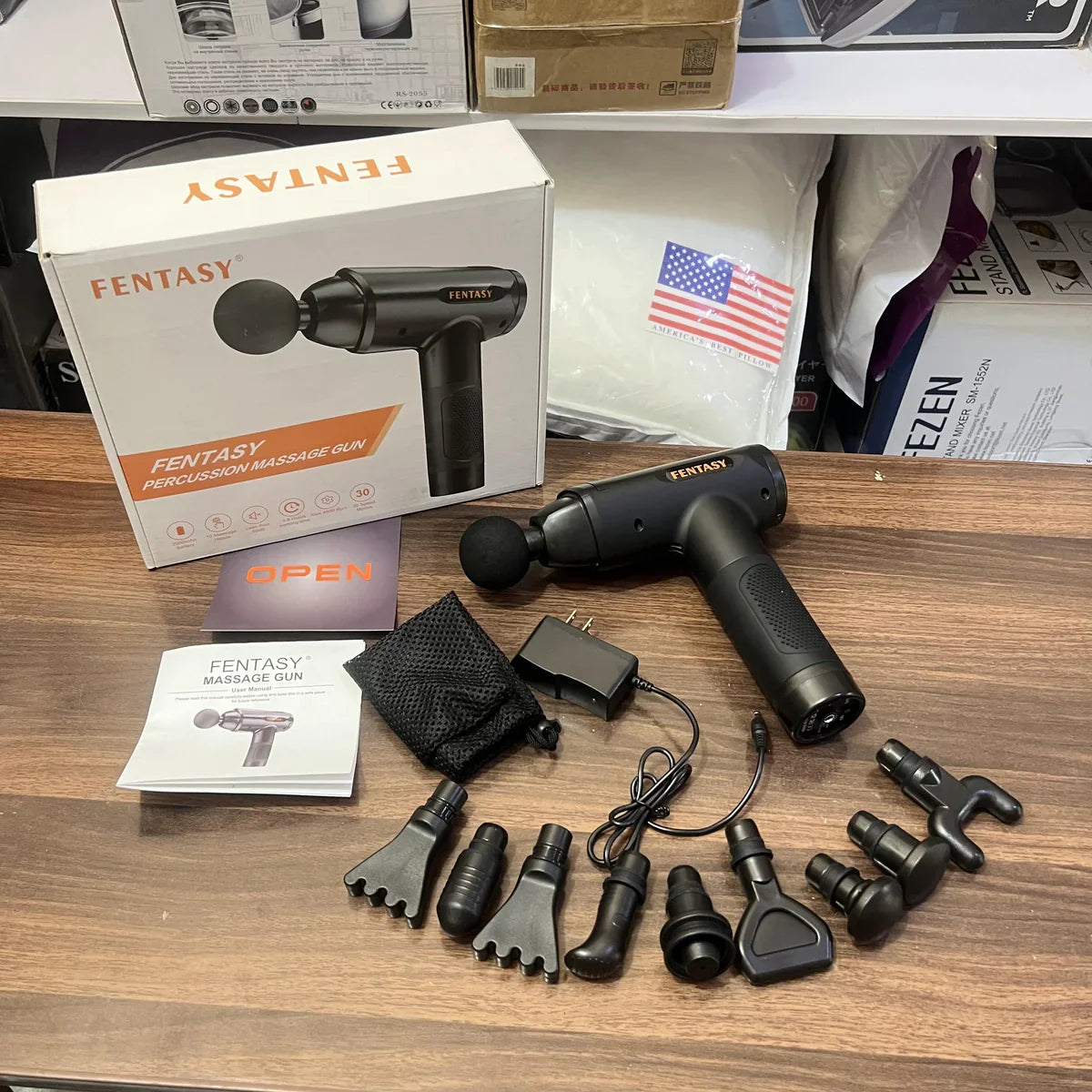 Massager packaging and included accessories