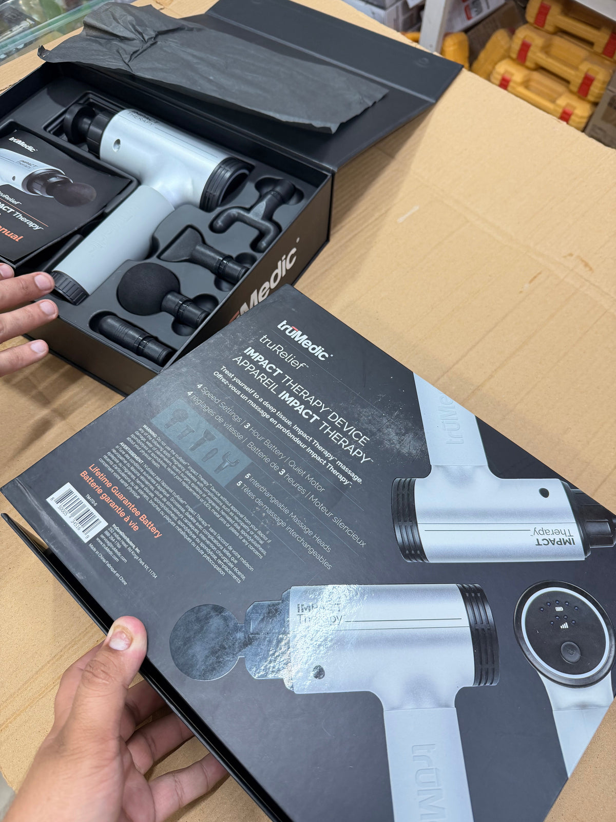 Massage gun packaging and full product box contents