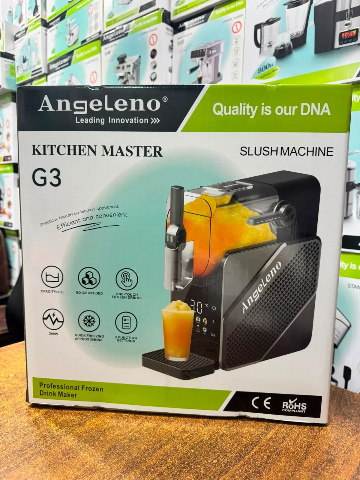 Slush machine shown with packaging and accessories